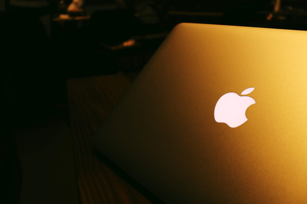 macbook-pro-at-night-with-apple-logo