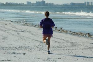 woman_jogger_beach_ocean__exercise